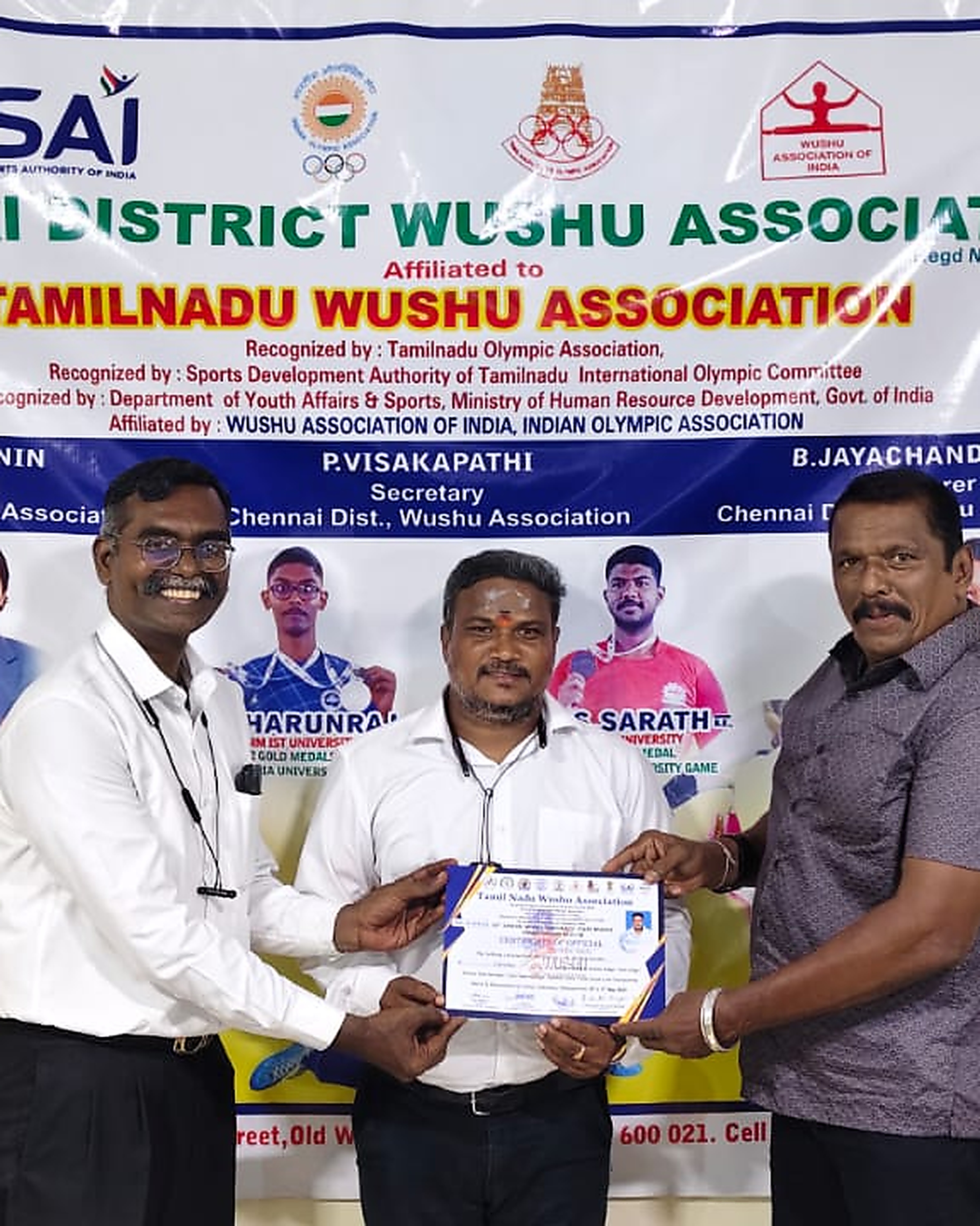 Master Buminathan receiving Wushu coaching certificate